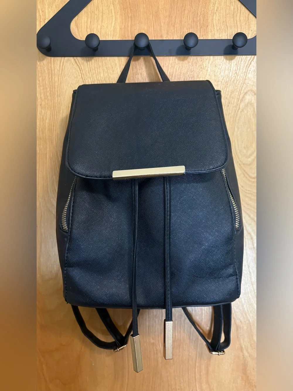 Black faux leather with gold detailing